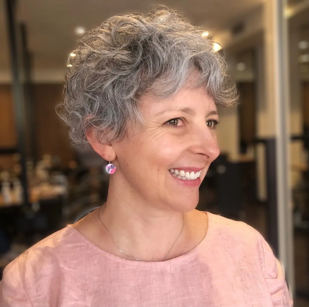 16-over-50-fun-gray-curly-pixie-hairstyle 16-over-50-fun-gray-curly-pixie-hairstyle.webp