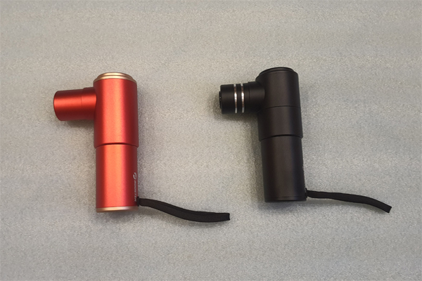 Перкуссионный массажёр Booster Mini Red (слева) и Booster Mini Black (справа)