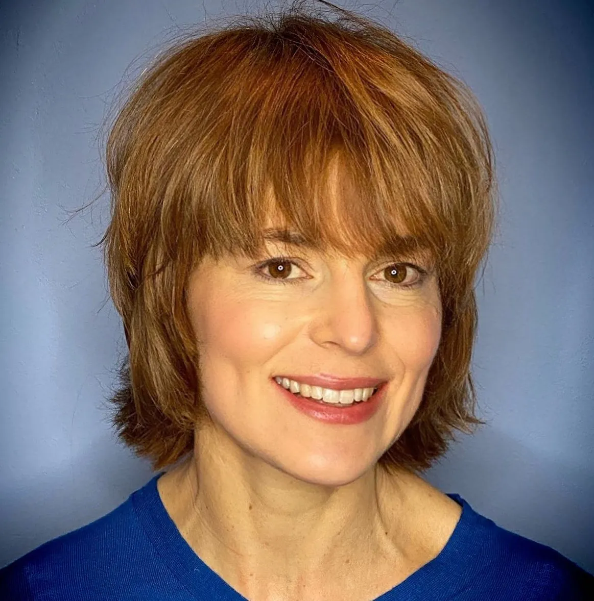 13-over-50-short-to-medium-ginger-shag 13-over-50-short-to-medium-ginger-shag.webp