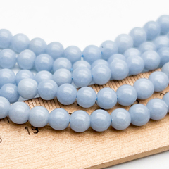 Ангелит бусины, диаметр около 6,6-6,8 мм, цена за 14 шт (1/4 нити)