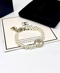 Браслет CHANEL из жемчужин с круглой подвеской