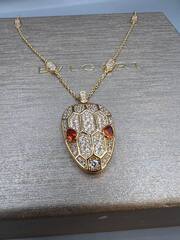 23935-kole-s-podveskoj-golova-zmei-s-kub-cirkonami-rose-vgold