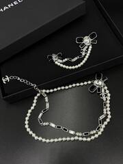 Колье цепочка с вставками из жемчуга и бантом CHANEL