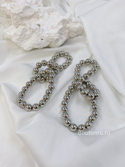 Серьги из бусин серебро бантики