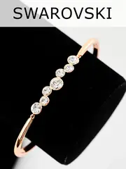 Жесткий браслет Эльза с белыми камнями Swarovski