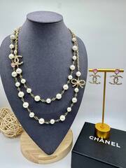 56175 - Колье CHANEL с жемчугом и бантиком