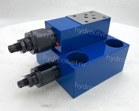 Фото LFA40DBWD2-7X/100 - Крышка для логического клапана, типоразмер Ду40 функционал - DBWD2 = крышка с предохранительным клапаном с ручной настройкой с функцией запирания, под установку распределителя Ду6, два выхода X и Y, элемент регулировки - винт под шестигранник с защитным колпачком, диапазон настройки давления до 100 бар, уплотнение NBR