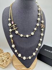 56175 - Колье CHANEL с жемчугом и бантиком