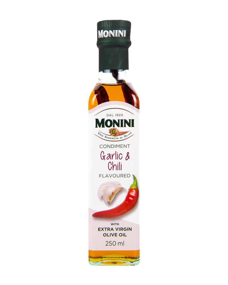 Масло оливковое Monini Экстра Вирджин Чеснок и перец 0.25л.