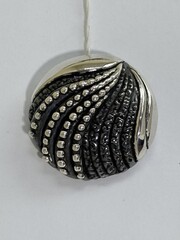 Воланы (брошь из серебра)