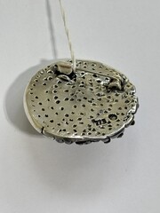Воланы (брошь из серебра)