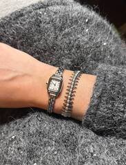 Браслет CLASH с шипами мягкий в стилистике CARTIER