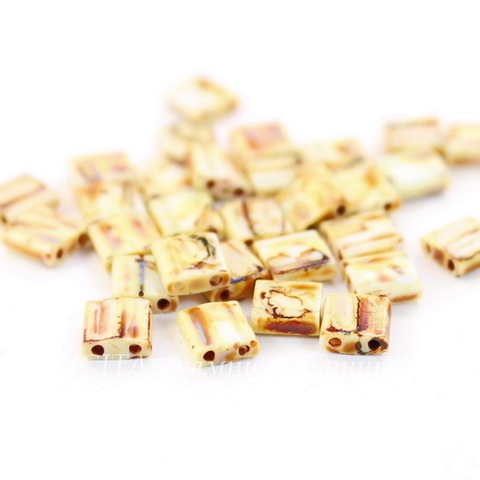 MIY-TL-4512 Бисер Miyuki Tila (Тила) с 2 отверстиями 5х5х1,9 мм непрозрачный светло-желтый Пикассо