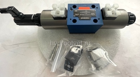 Фото 4WRE10V50-2X/G24K4/V - Пропорциональный распределитель с обратной связью по положению золотника без встроенной электроники Ду10, номинальный расход 50 л/мин, схема V