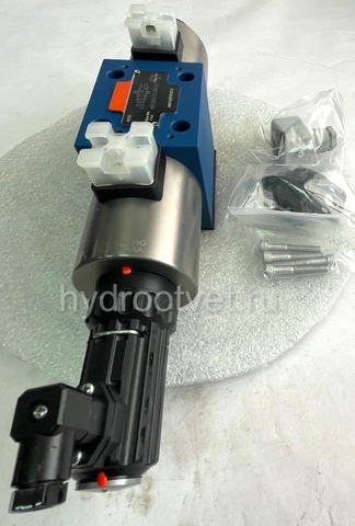 Фото 4WRE10V50-2X/G24K4/V - Пропорциональный распределитель с обратной связью по положению золотника без встроенной электроники Ду10, номинальный расход 50 л/мин, схема V