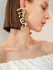 sergi-krupnye-v-stile-schiaparelli-s-podveskami-s-dollar