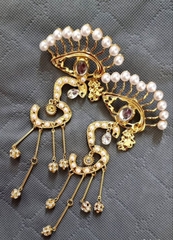 sergi-krupnye-v-stile-schiaparelli-s-podveskami-s-dollar