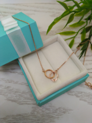 kole-dva-spletennyh-kolca-iz-zolota-585-proby-v-stile-cartier