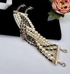 Браслет широкий многорядный CHANEL со вставками из кожи и жемчуга