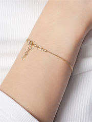 Браслет Trendy Gold из золота с подвеской клевер с черным ониксом (один мотив)