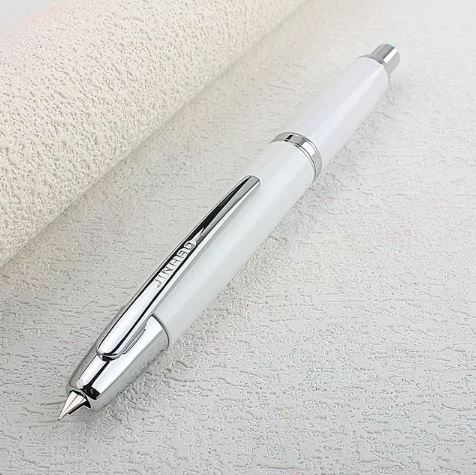 Перьевая ручка Jinhao 10 capless, Китай. Перо EF (0.4 мм) выдвигается нажатием на кнопку. Корпус металл. Цвет белый . Распродажа 3200 руб. Новинка!