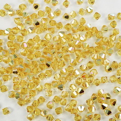 5328 Бусина - биконус Сваровски Light Topaz AB 4 мм, 10 штук