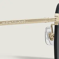 Солнцезащитные очки круглой формы в металлической оправе золотистого цвета