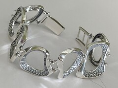 Метафора  (серебряный браслет)