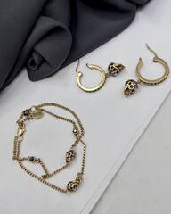Браслет двухрядный с подвесками черепами в стиле Alexander McQueen