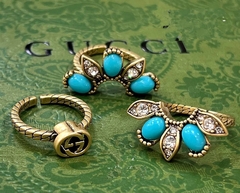 set-iz-trekh-kolec-romashka-style-by-gucci-s-cvetnymi-vstavkami