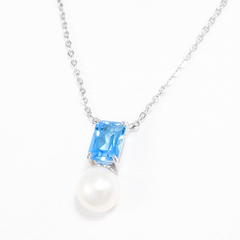 kole-iz-belogo-zolota-585-proby-s-topazom-swiss-i-zhemchugom