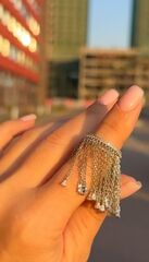 Кольцо из серебра с подвесками цепочками по кругу