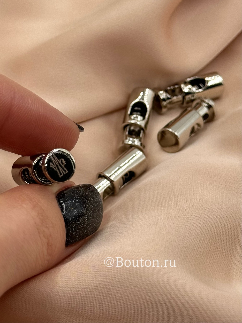 Фиксатор для шнура Монкл. серебро