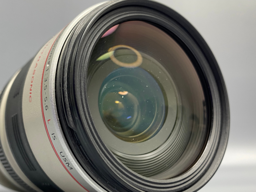 Canon 28-300mm 3.5-5.6L IS USM Пылинки под линзой