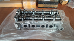 Головка блока цилиндров Geely Emgrand X7 2.0 в сборе с распредвалами