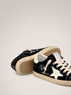 Super Star in black suede with white leather star and heel tab