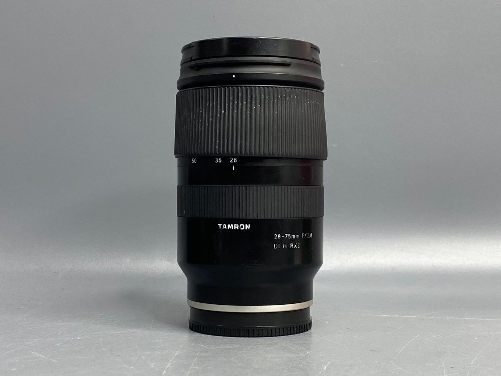 Tamron 28-75mm 2.8 Di III RXD Sony E пыль внутри линзы