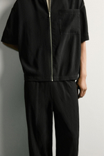 БРЮКИ RELAXED FIT ИЗ РЕЛЬЕФНОЙ ТКАНИ — ZARA · 7380/100