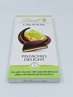 Шоколад LINDT Creation темный с начинкой Pistachio Delight Фисташковое наслаждение (фисташки, миндаль, печенье)150 г (из Финляндии)