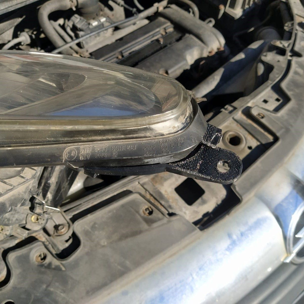 Кронштейн крепления фары для Opel Corsa D 2006-2011 г.в.
