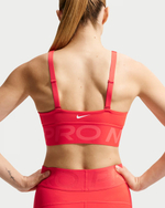 Nike Pro Indy Plunge Женский спортивный бюстгальтер со средней поддержкой и вставками - NIKE