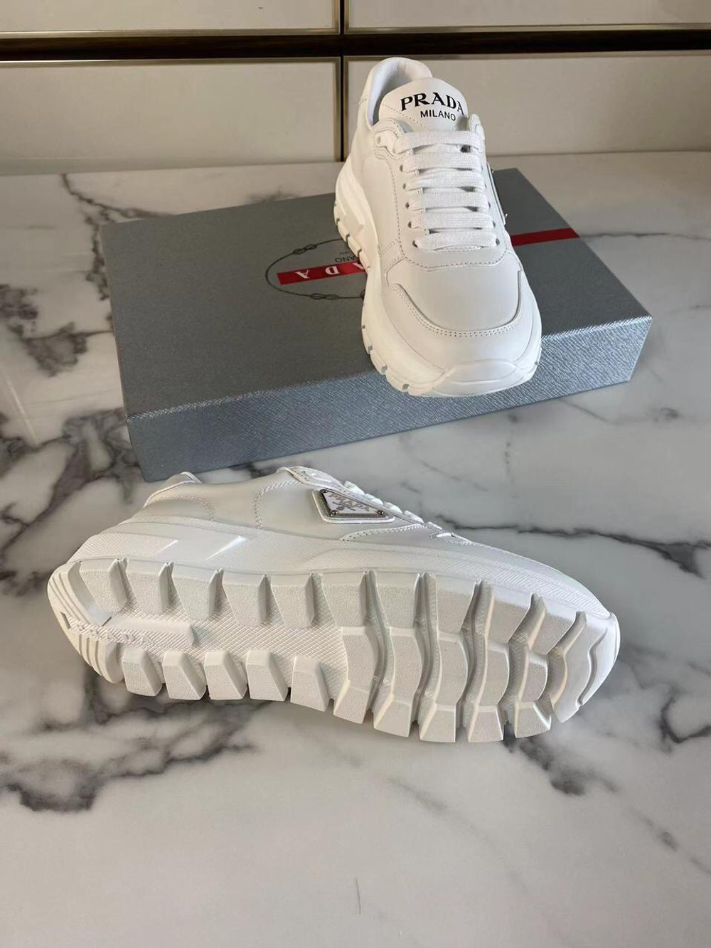 Кроссовки Prada