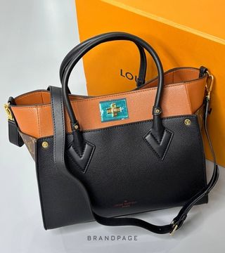 Сумка-тоут чёрная с коньячно-коричневыми вставками от Louis Vuitton Milla MM BP5-443770