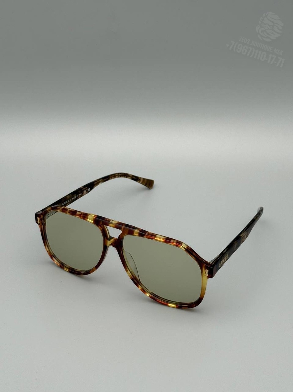 Солнцезащитные очки Gucci