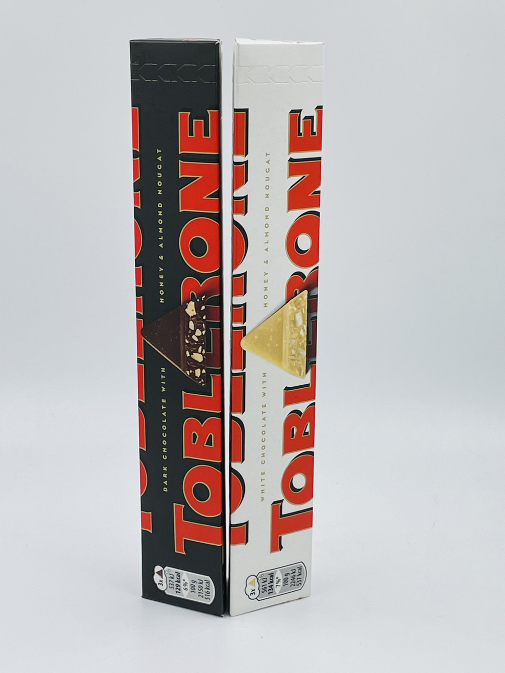 Toblerone темный шоколад с медом и нугой 100 г + белый шоколад с медом и нугой 100 г (Швейцария)