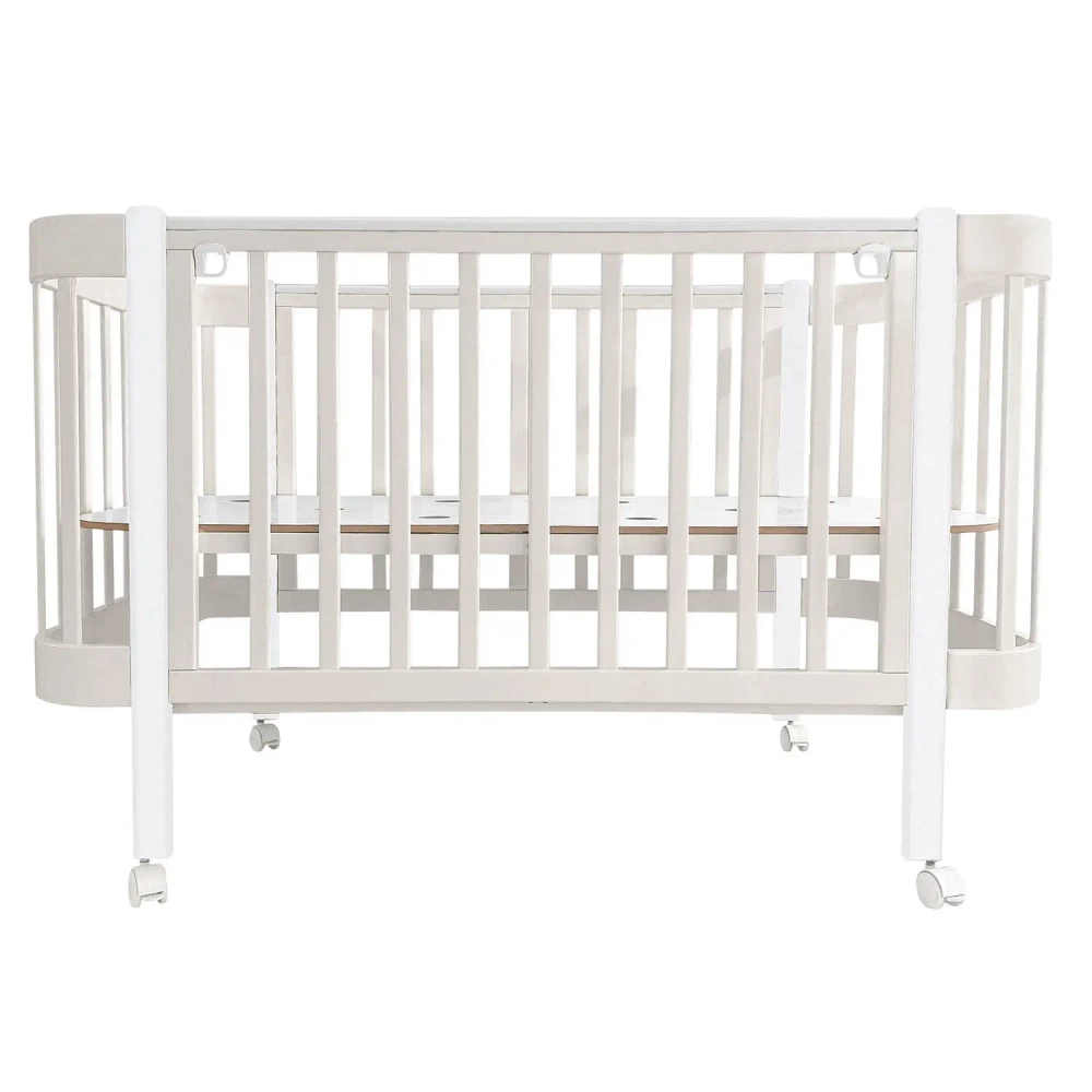 Кровать детская Indigo Italiano Baby продольный маятник на колесах кашемир-белый