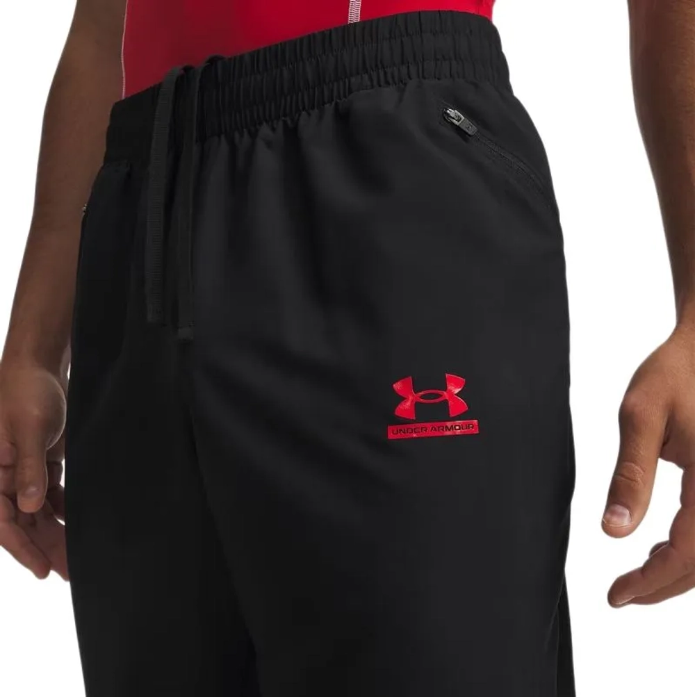 Мужские теннисные штаны Under Armour Tech Sport Pants - black/racer red