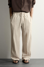 БРЮКИ RELAXED FIT ИЗ ТЕХНОЛОГИЧНОЙ ТКАНИ С ЭФФЕКТОМ ПОМЯТОСТИ — ZARA