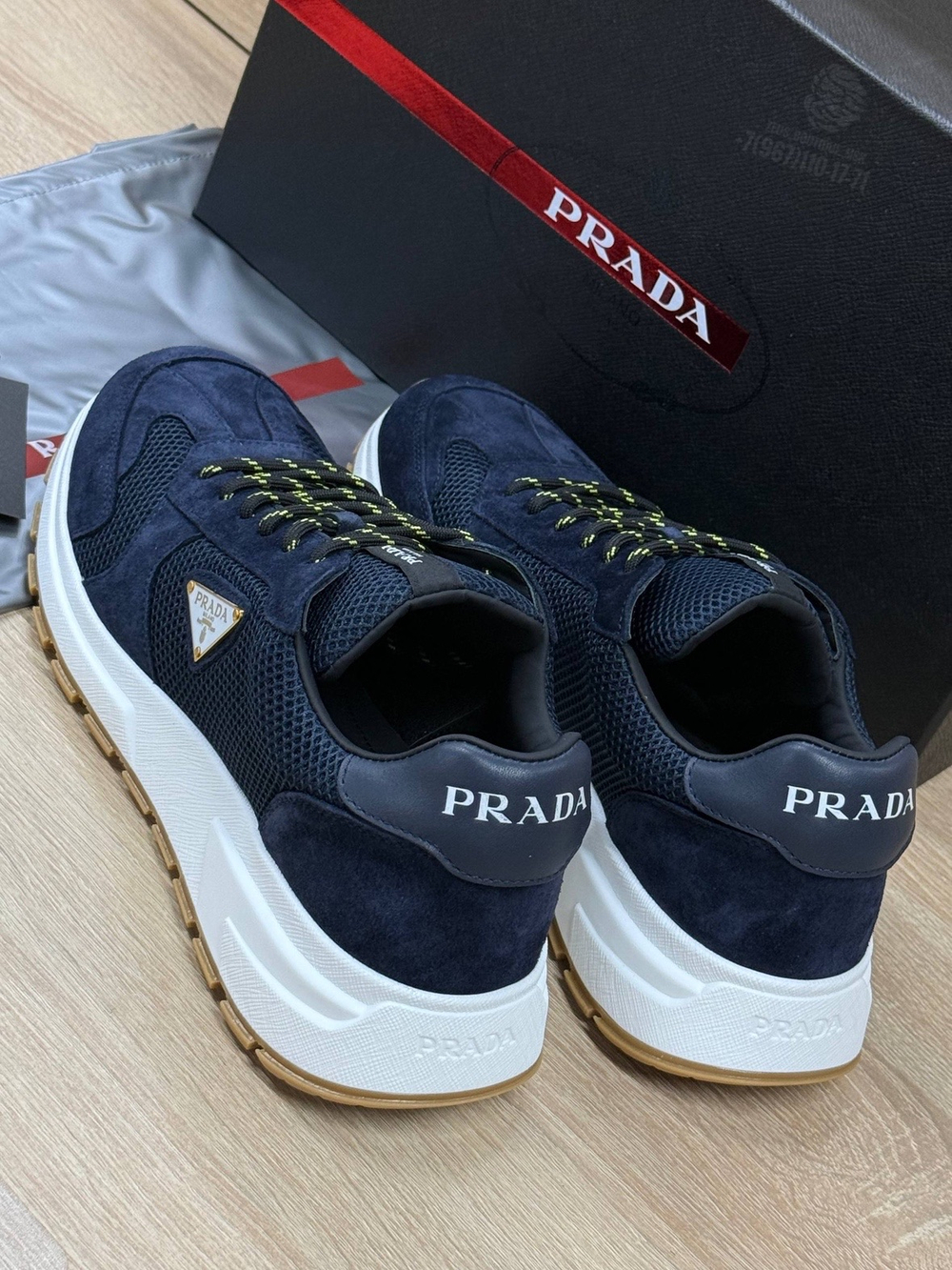 Кроссовки Prada