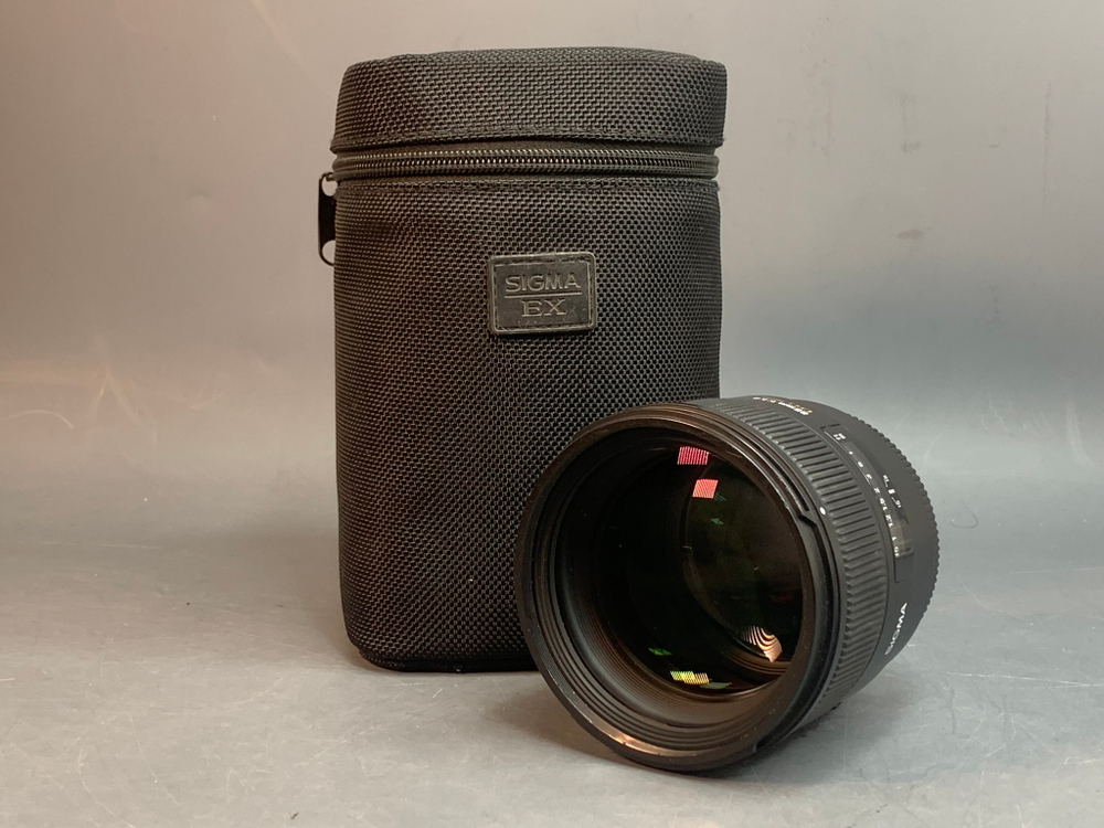 Sigma AF 85mm 1.4 EX DG HSM Canon EF царапины на передней линзе